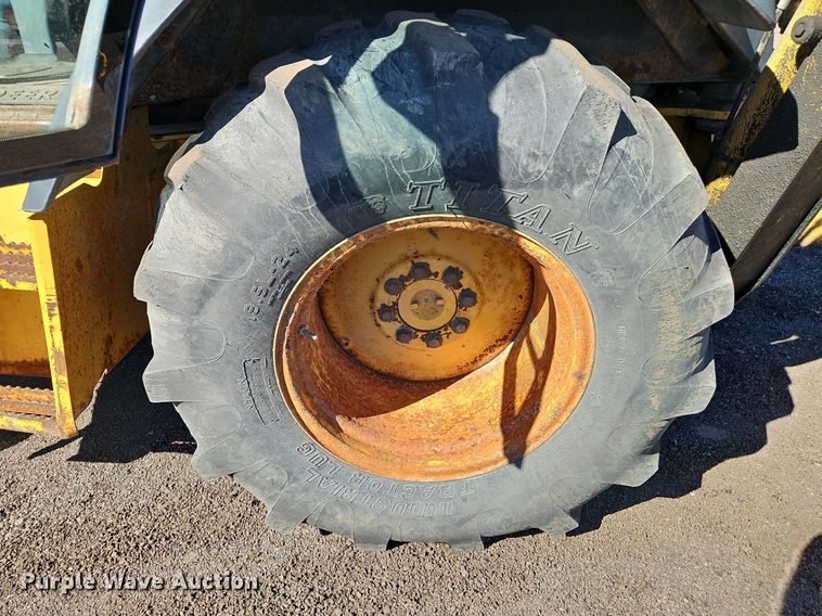 image for item OJ9500 2003 John Deere 310G backhoe