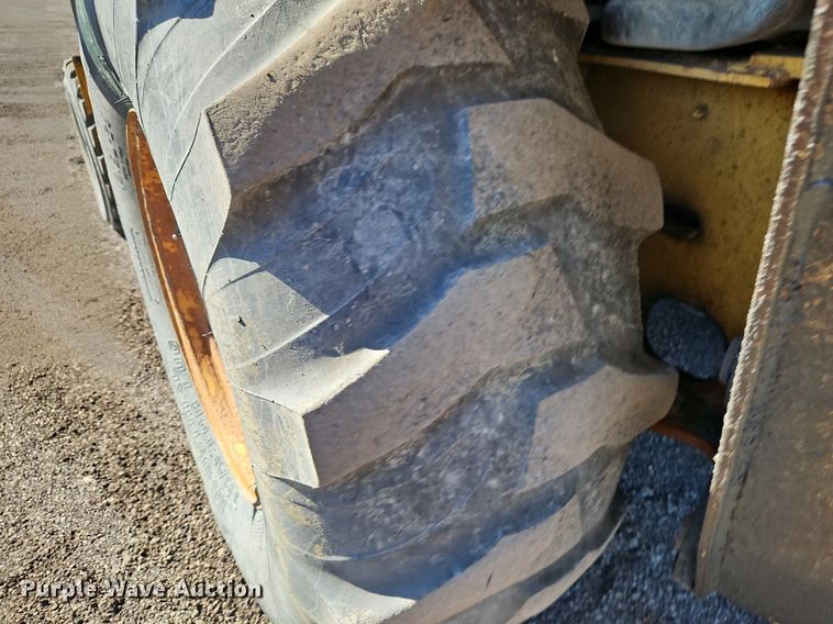 image for item OJ9500 2003 John Deere 310G backhoe