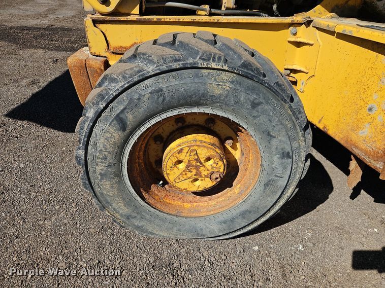 image for item OJ9500 2003 John Deere 310G backhoe