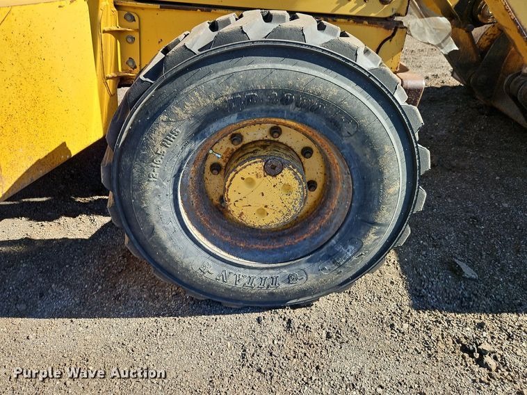 image for item OJ9501 2003 John Deere 310G backhoe