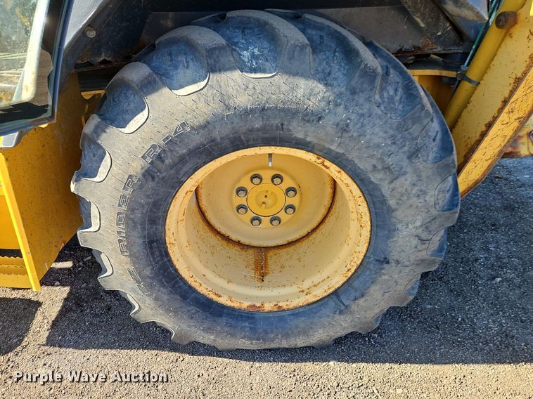 image for item OJ9501 2003 John Deere 310G backhoe