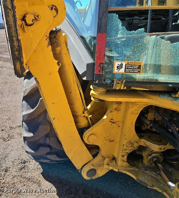 image for item OJ9504 2003 John Deere 310G backhoe