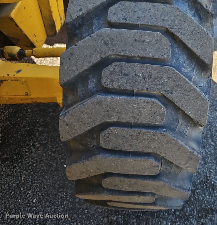 image for item OJ9504 2003 John Deere 310G backhoe