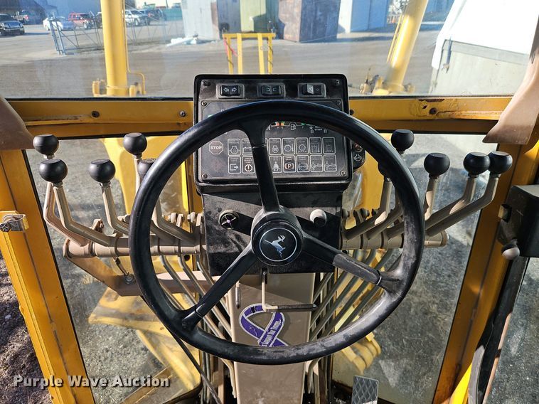 image for item OJ9510 2000 John Deere 770CH motor grader