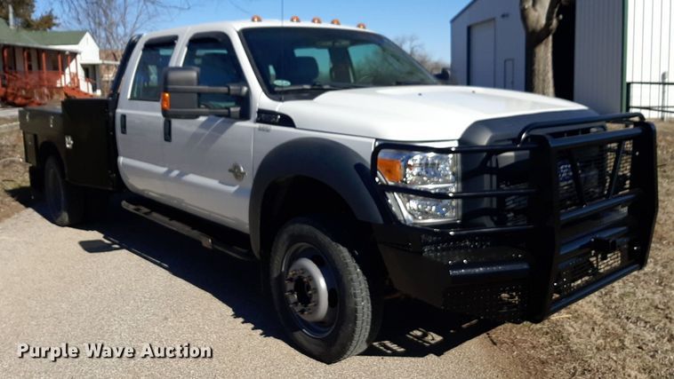 image for item DV9822 2012 Ford F550 Super Duty Crew Cab flatbed truck