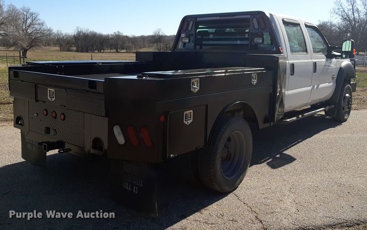 image for item DV9822 2012 Ford F550 Super Duty Crew Cab flatbed truck