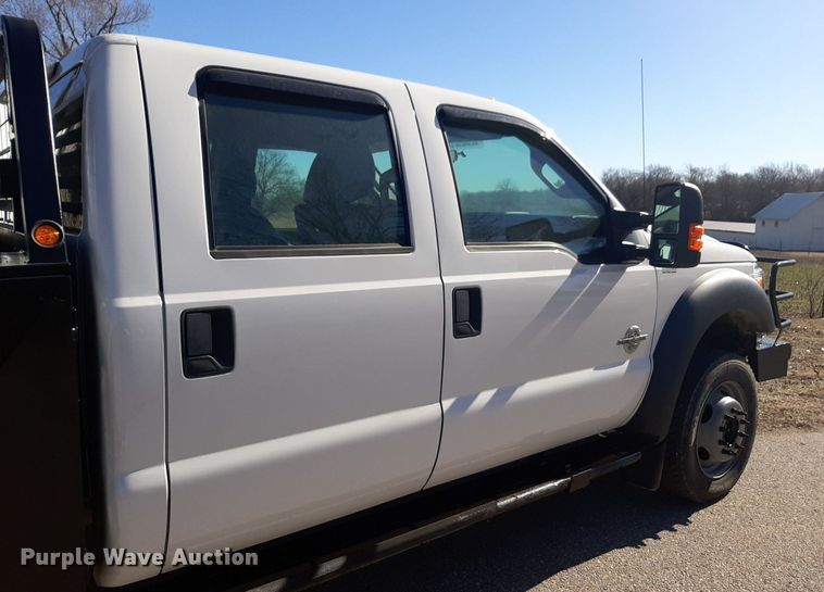 image for item DV9822 2012 Ford F550 Super Duty Crew Cab flatbed truck