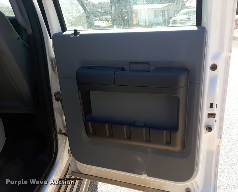 image for item DV9822 2012 Ford F550 Super Duty Crew Cab flatbed truck