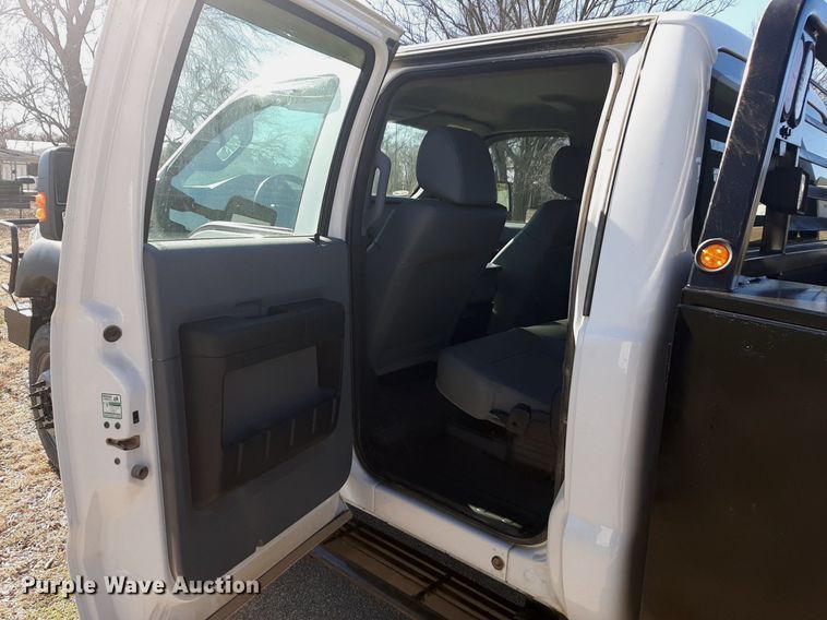 image for item DV9822 2012 Ford F550 Super Duty Crew Cab flatbed truck