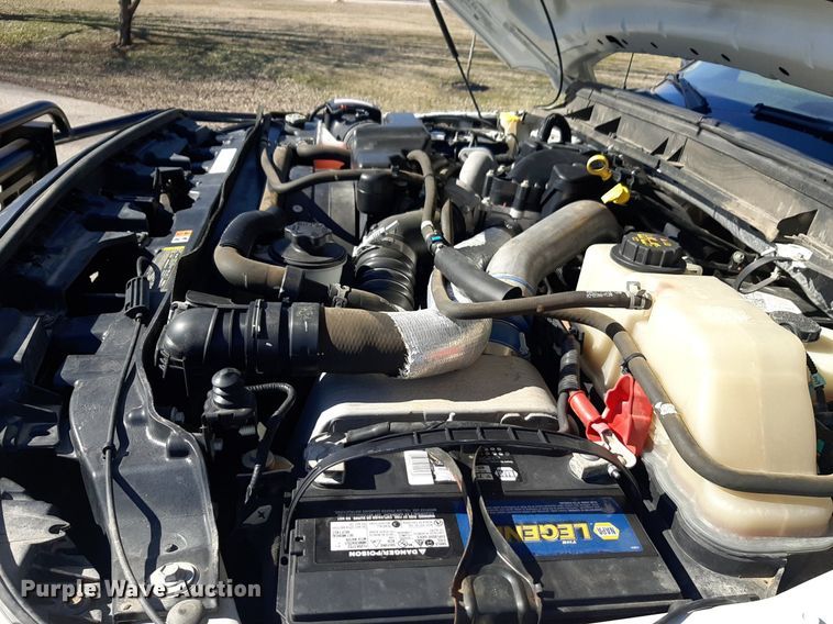 image for item DV9822 2012 Ford F550 Super Duty Crew Cab flatbed truck