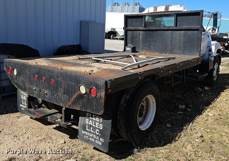 image for item EJ6023 2000 GMC C7500 flatbed truck