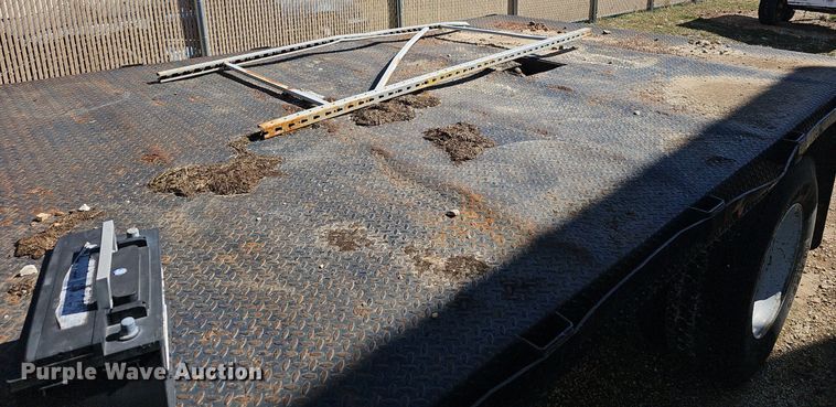 image for item EJ6023 2000 GMC C7500 flatbed truck