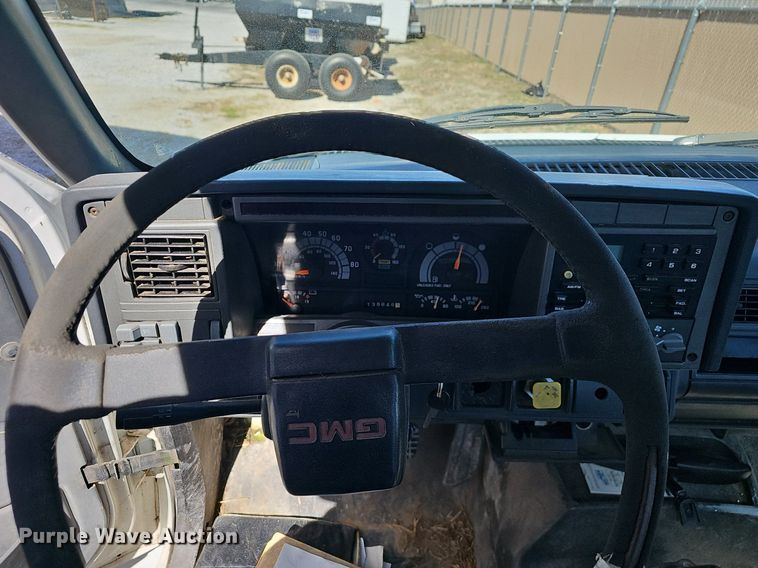 image for item EJ6023 2000 GMC C7500 flatbed truck