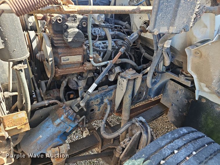 image for item EJ6023 2000 GMC C7500 flatbed truck