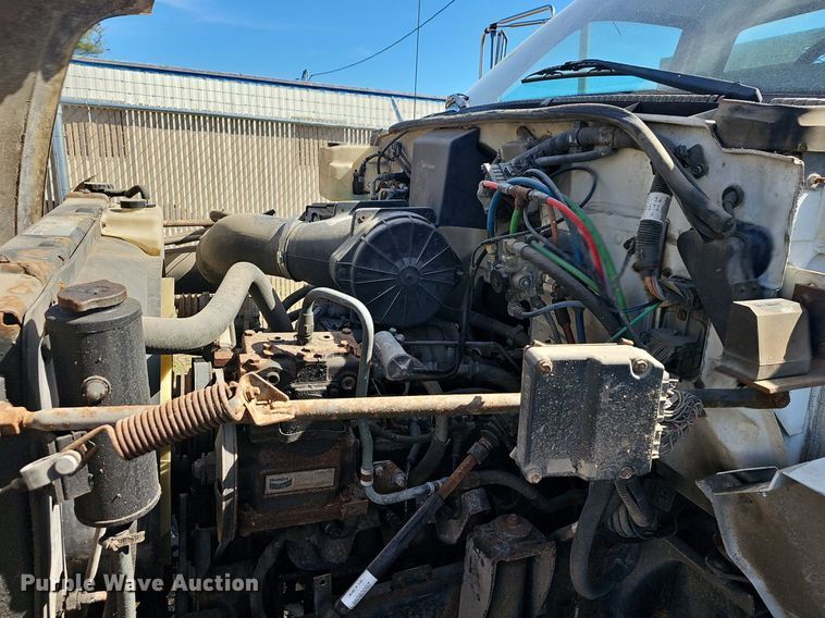 image for item EJ6023 2000 GMC C7500 flatbed truck