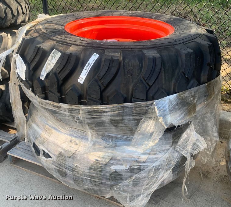 image for item KX9906 (2) Titan 17.5L-24 IND tractor tires and wheels