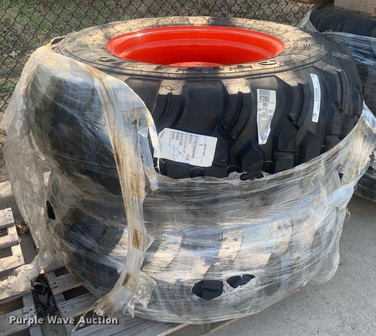 image for item KX9906 (2) Titan 17.5L-24 IND tractor tires and wheels