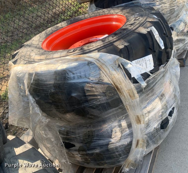 image for item KX9906 (2) Titan 17.5L-24 IND tractor tires and wheels