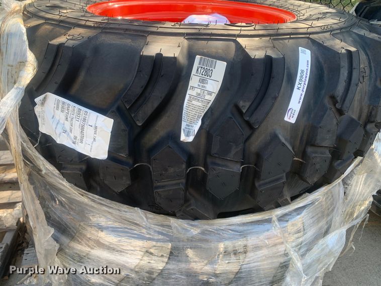 image for item KX9906 (2) Titan 17.5L-24 IND tractor tires and wheels