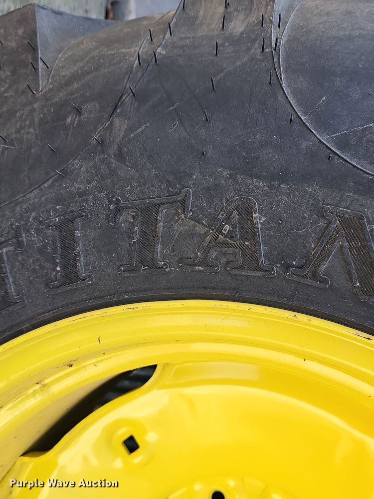 image for item NE9540 (4) used Titan tractor tires and wheels