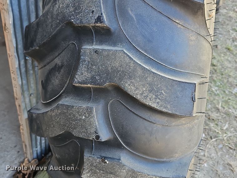 image for item NE9540 (4) used Titan tractor tires and wheels