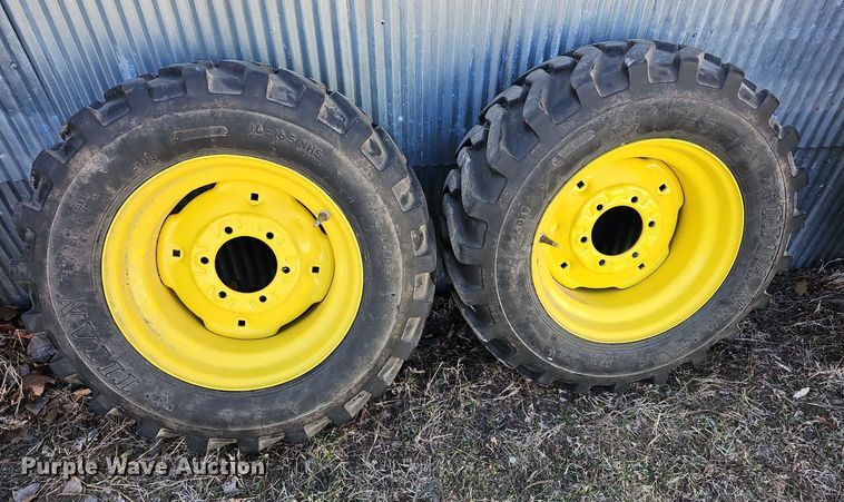 image for item NE9540 (4) used Titan tractor tires and wheels