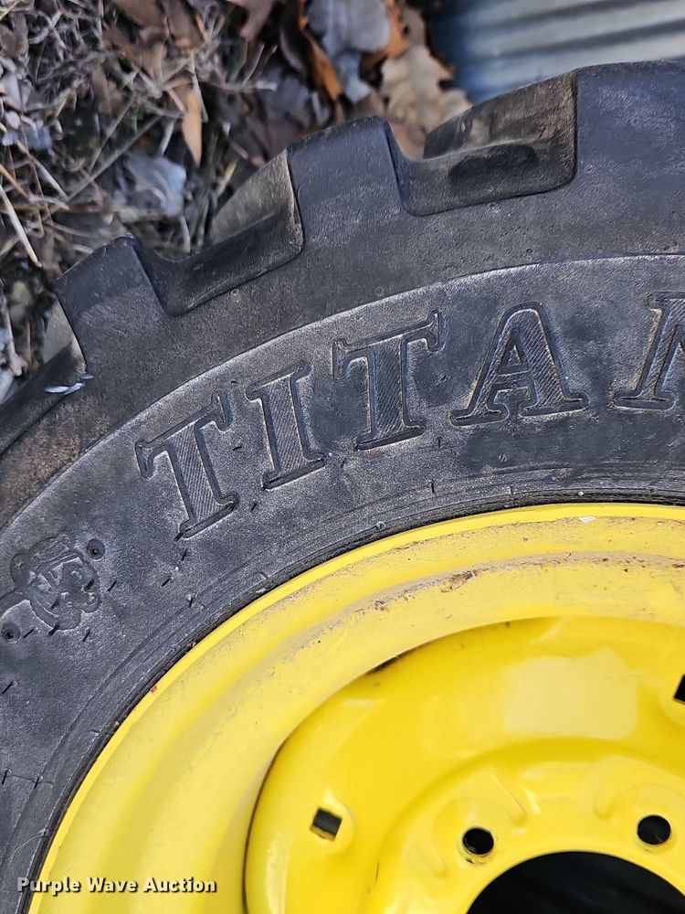 image for item NE9540 (4) used Titan tractor tires and wheels