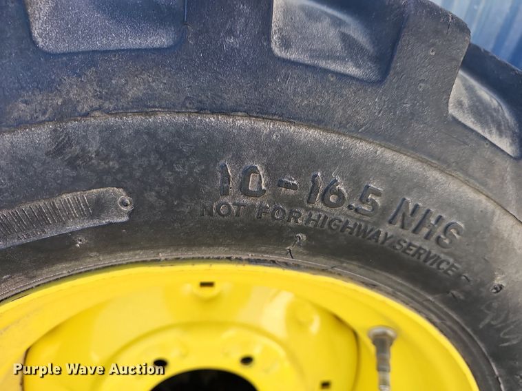 image for item NE9540 (4) used Titan tractor tires and wheels
