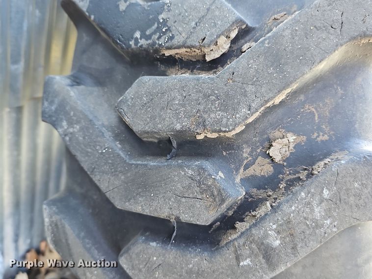 image for item NE9540 (4) used Titan tractor tires and wheels