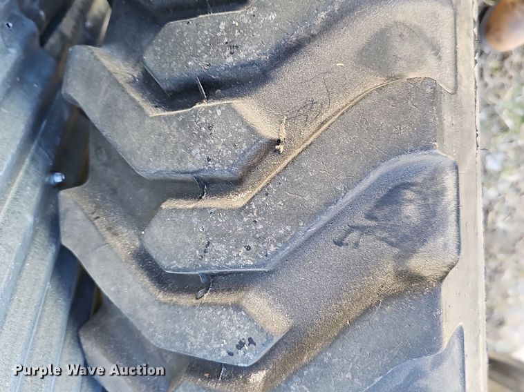 image for item NE9540 (4) used Titan tractor tires and wheels