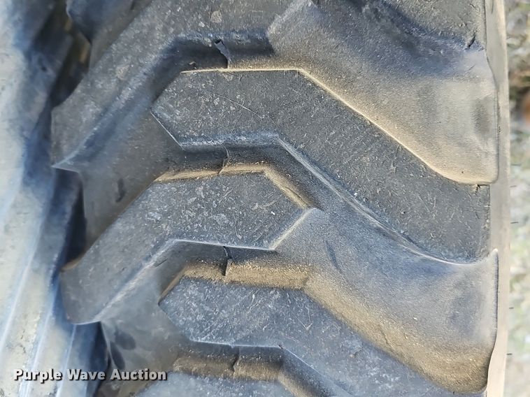 image for item NE9540 (4) used Titan tractor tires and wheels