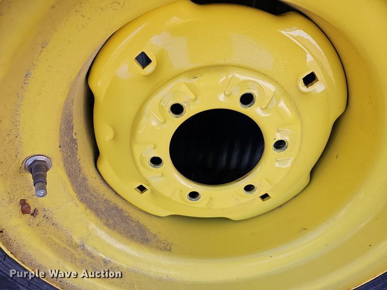 image for item NE9540 (4) used Titan tractor tires and wheels