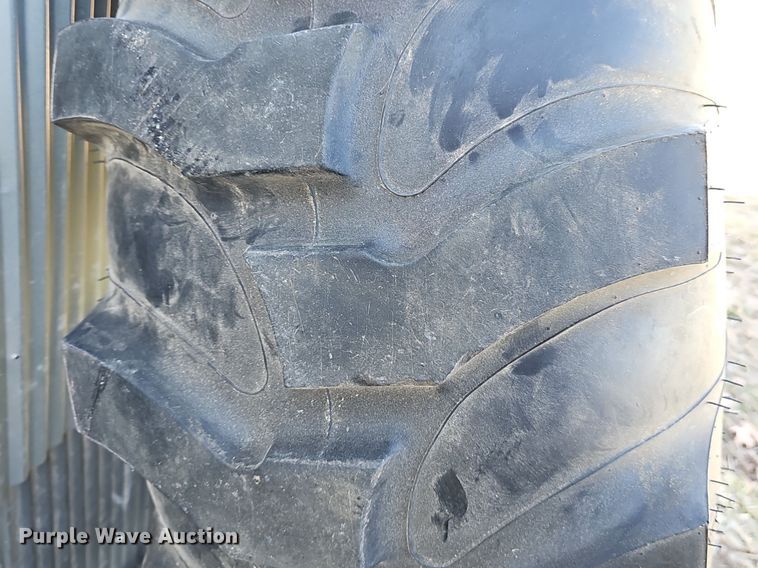 image for item NE9540 (4) used Titan tractor tires and wheels