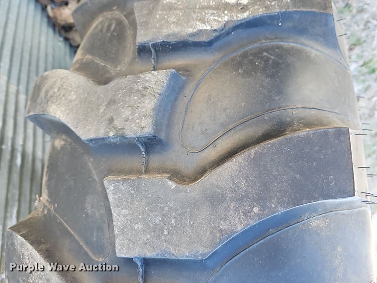 image for item NE9540 (4) used Titan tractor tires and wheels