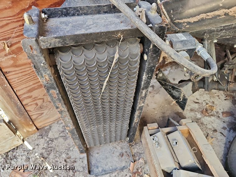 image for item NE9546 2005 Ryan Cushman Core Harvester attachment