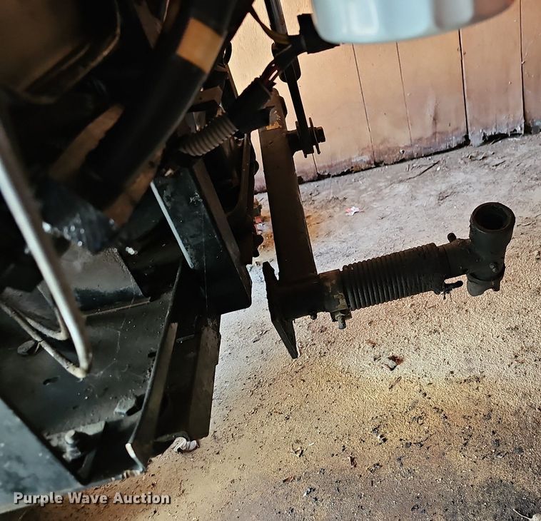 image for item NE9546 2005 Ryan Cushman Core Harvester attachment