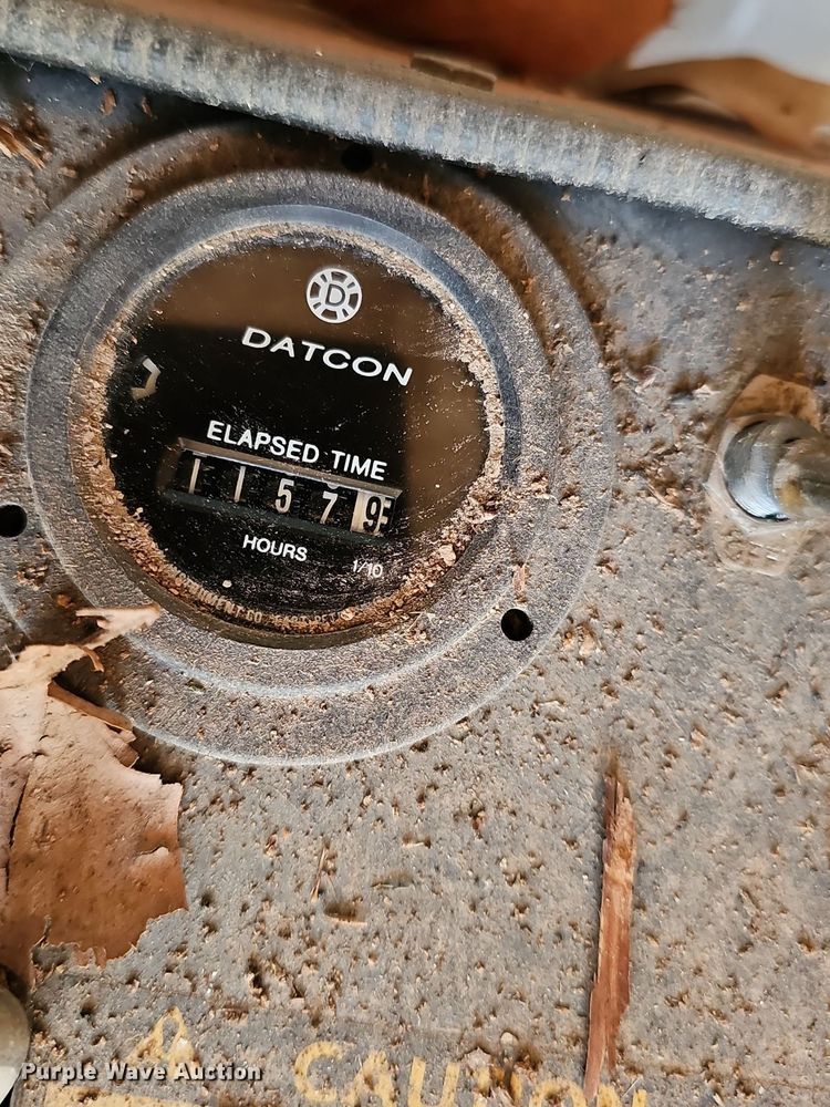 image for item NE9546 2005 Ryan Cushman Core Harvester attachment