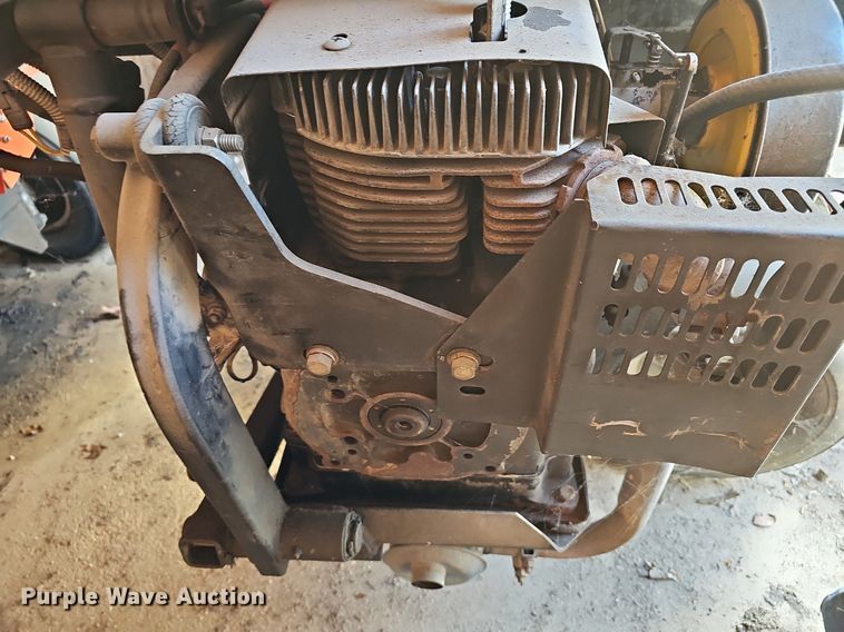 image for item NE9546 2005 Ryan Cushman Core Harvester attachment