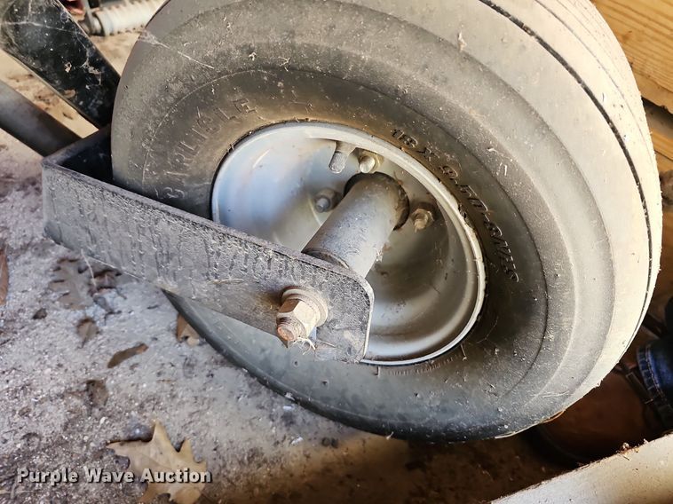 image for item NE9546 2005 Ryan Cushman Core Harvester attachment