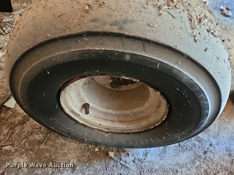 image for item NE9546 2005 Ryan Cushman Core Harvester attachment