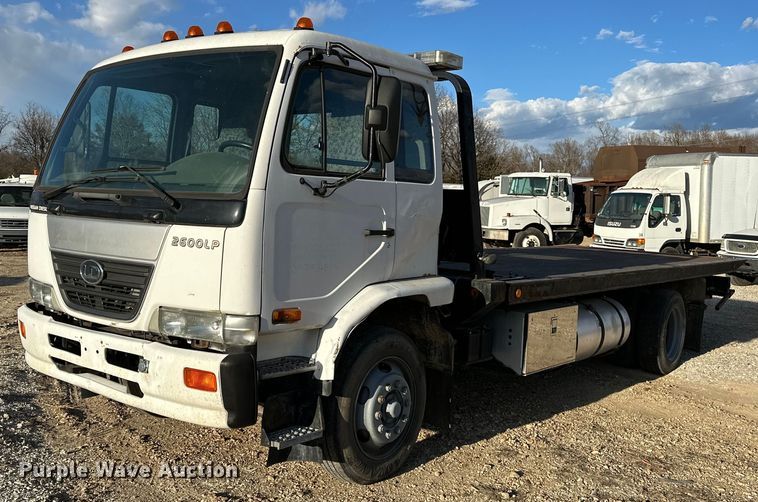 image for item OM9877 2010 Nissan  2600LP UD rollback truck