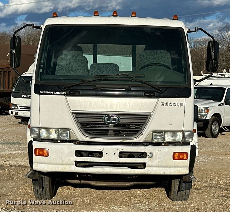 image for item OM9877 2010 Nissan  2600LP UD rollback truck