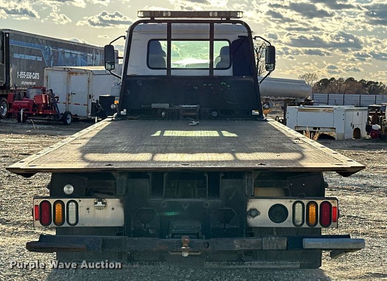 image for item OM9877 2010 Nissan  2600LP UD rollback truck