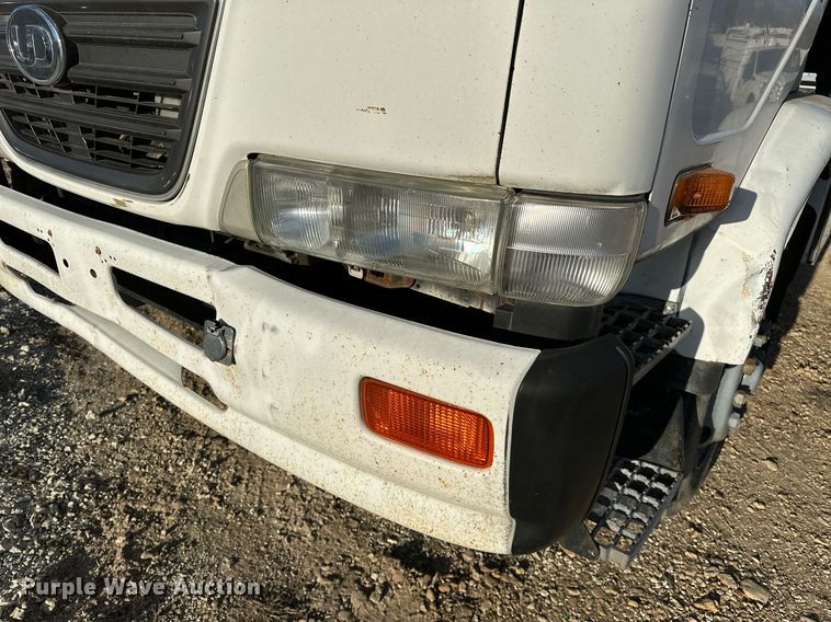 image for item OM9877 2010 Nissan  2600LP UD rollback truck