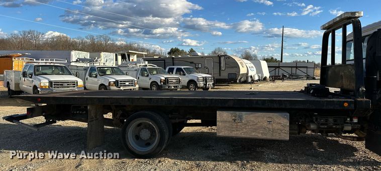 image for item OM9877 2010 Nissan  2600LP UD rollback truck