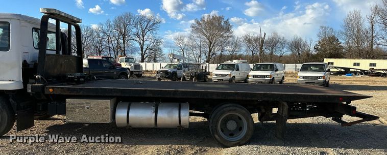 image for item OM9877 2010 Nissan  2600LP UD rollback truck