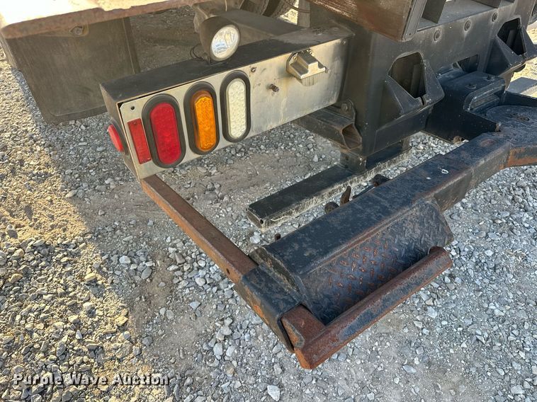 image for item OM9877 2010 Nissan  2600LP UD rollback truck