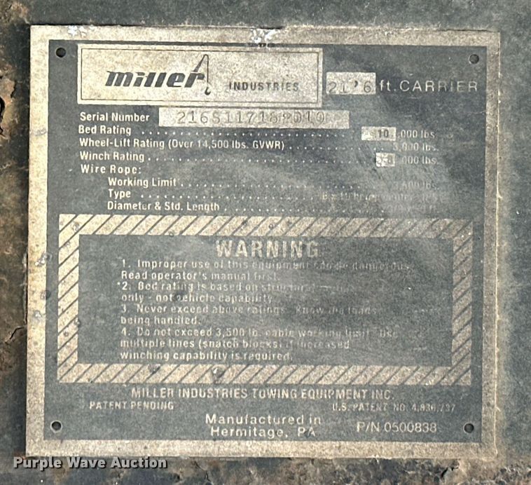 image for item OM9877 2010 Nissan  2600LP UD rollback truck