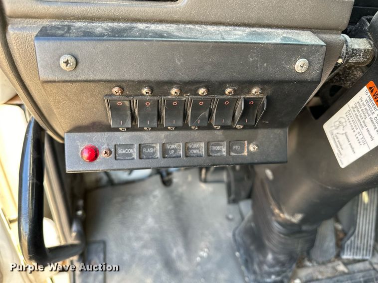 image for item OM9877 2010 Nissan  2600LP UD rollback truck