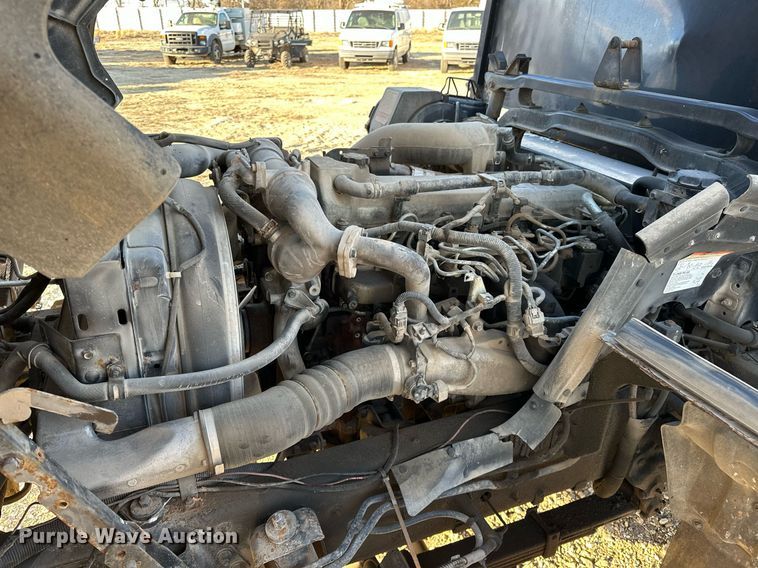 image for item OM9877 2010 Nissan  2600LP UD rollback truck